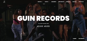Guin Records’ homepage features bold typography, vibrant visuals, and easy navigation, highlighting its artist-friendly, energetic brand identity.