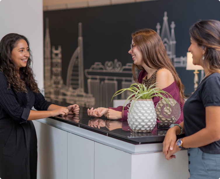 Clutch employees gather to collaborate together across teams.