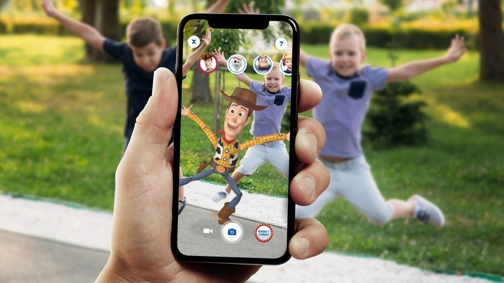 Users can take photos of them interacting with Toy Story characters.