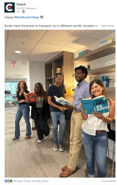 Clutch Employees reading a book 