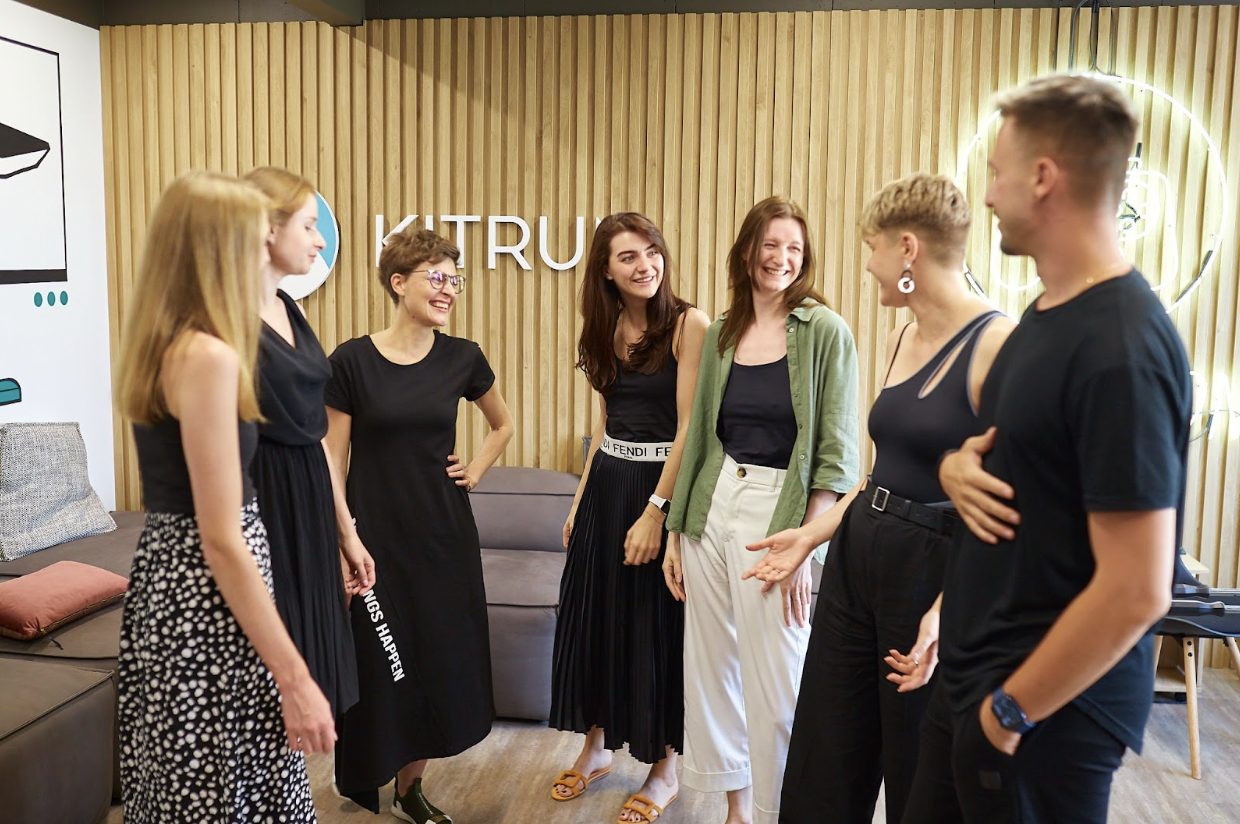 teammates collaborating in-person