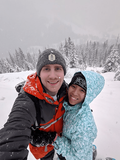 Two people outside in the snow