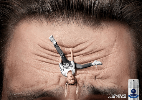 girl hangs upside down like she's rock climbing wrinkles