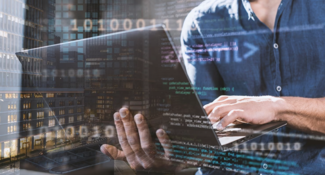 Person holding a laptop