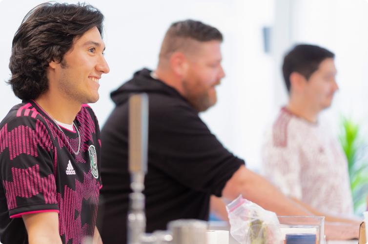 Clutch employees gather to learn from one another. 