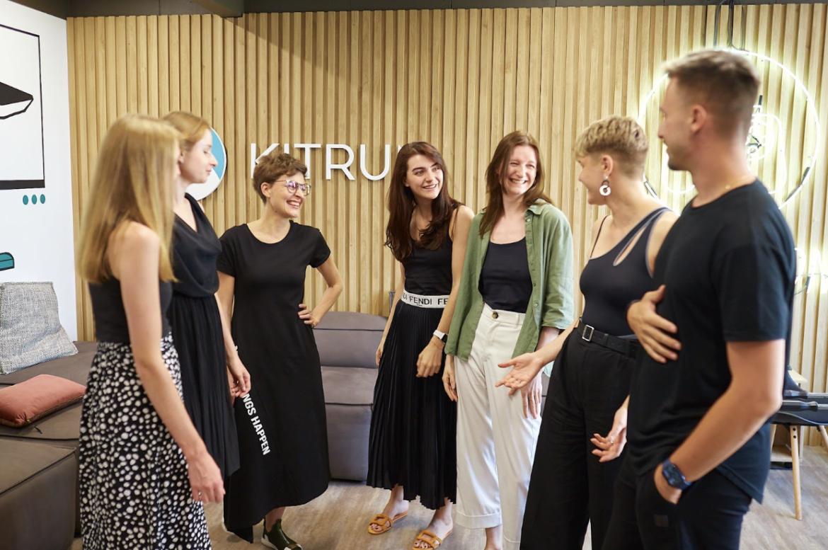 teammates collaborating in-person