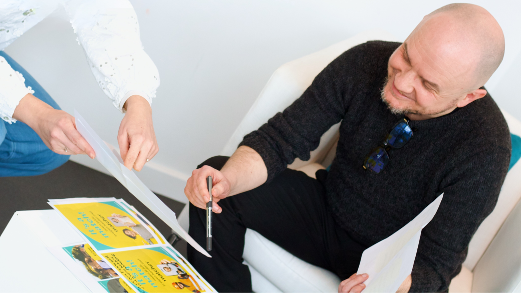 Employees discussing brand ideas