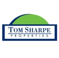 Tom Sharpe Properties LLC Logo
