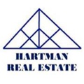 Hartman Real Estate, Inc. Logo