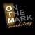 On The Mark Marketing, LLC Logo